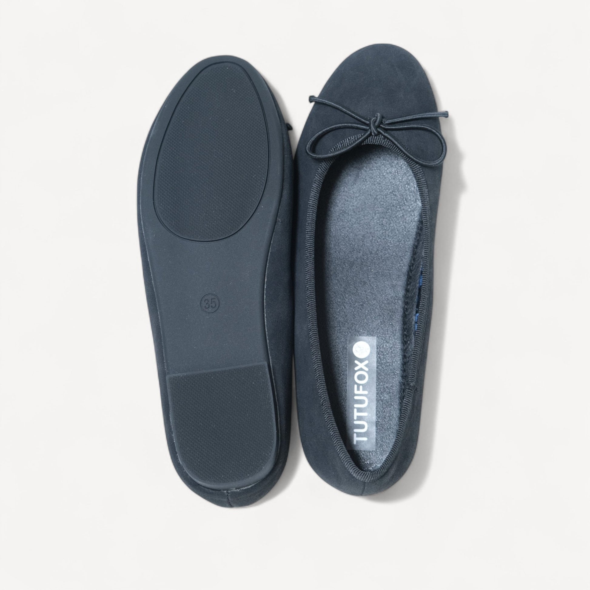 black almond toe bow ballet flats sole view