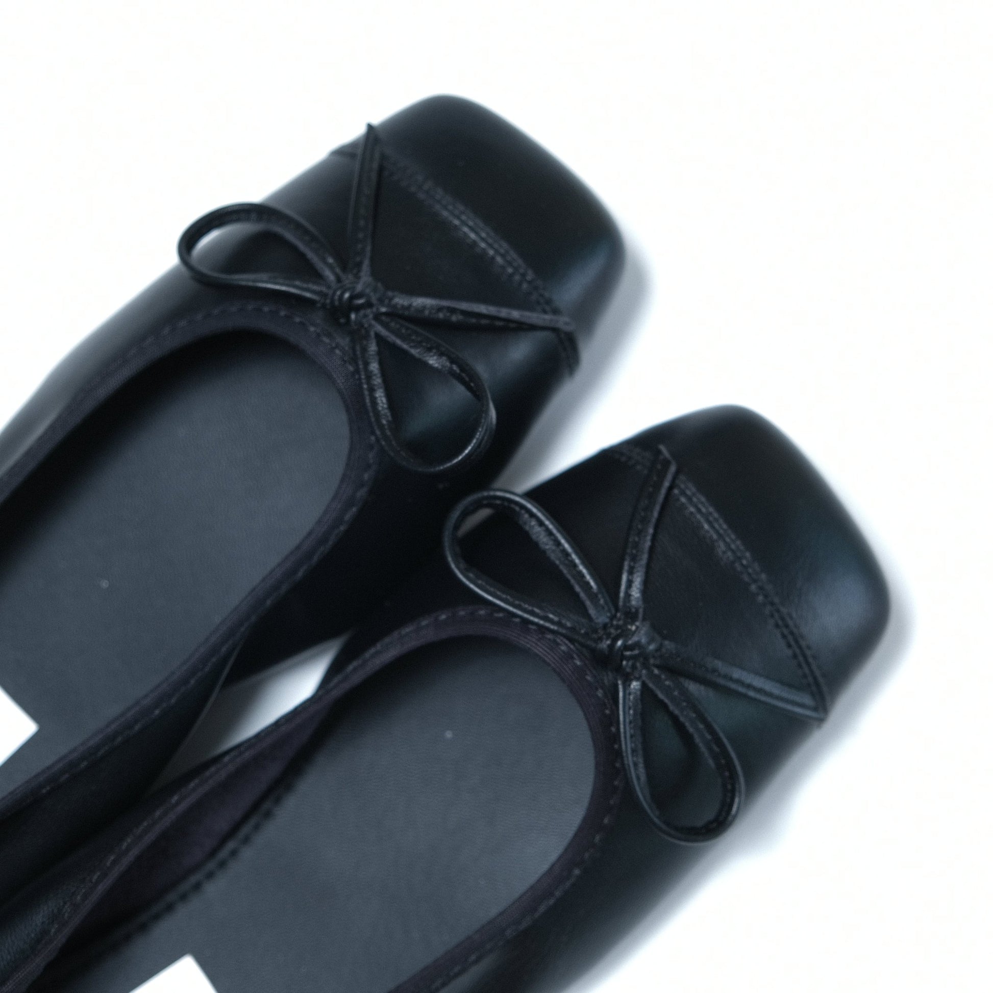 black bow square toe leather ballet flats toe details view