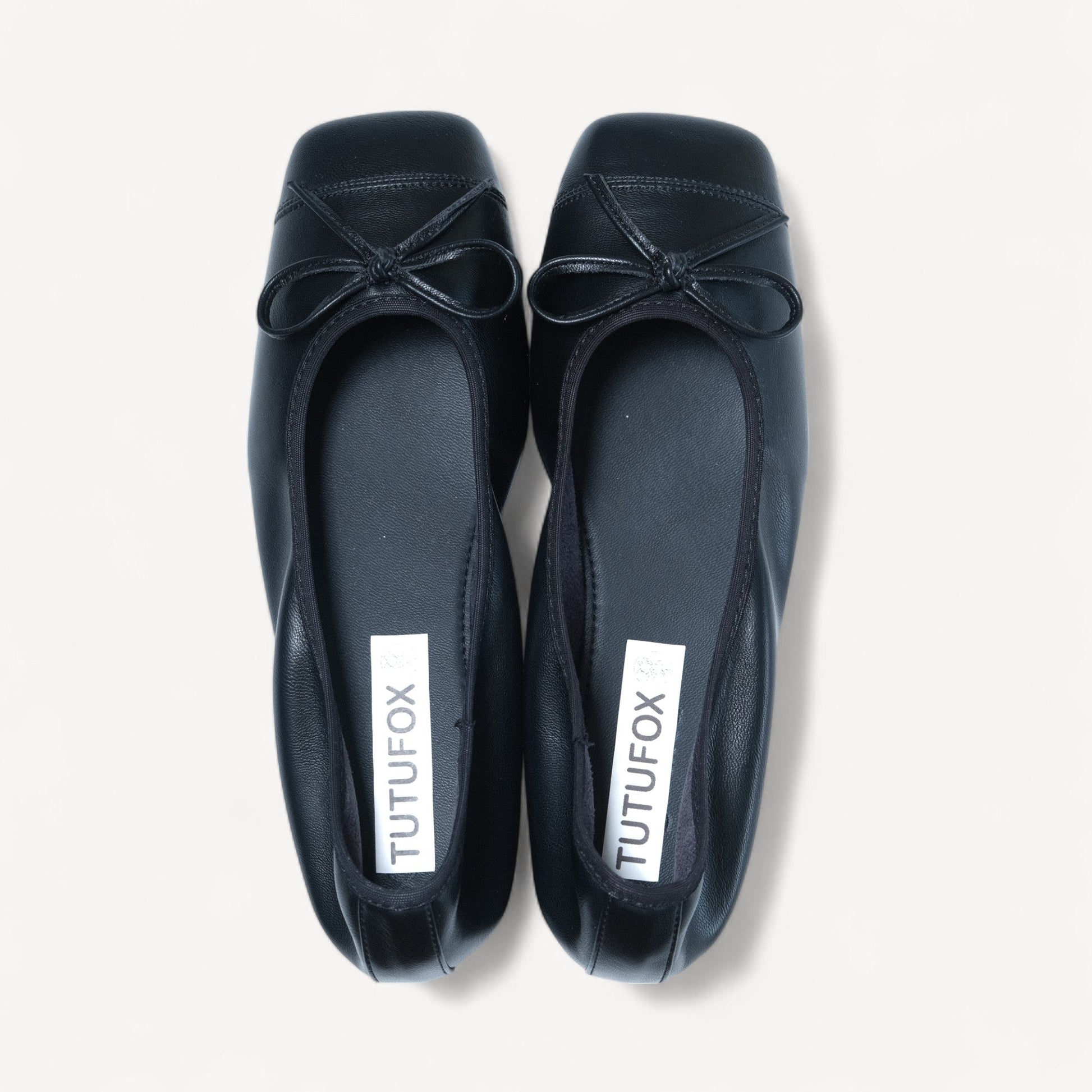 black bow square toe leather ballet flats front view