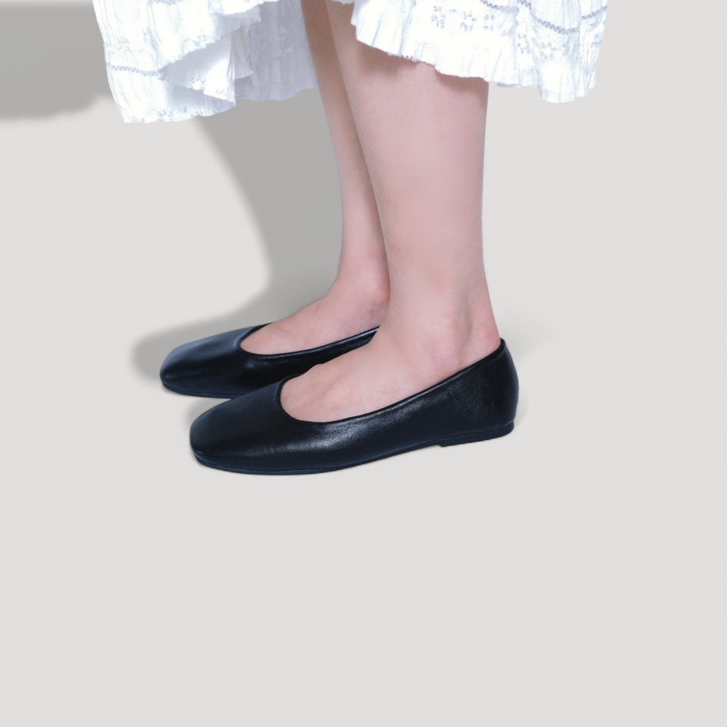 leather square toe flats black model standing view
