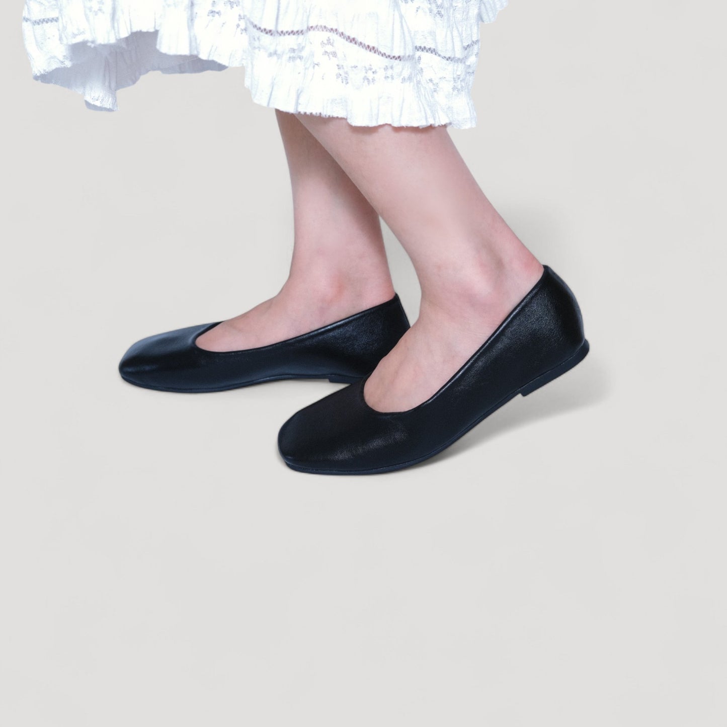 leather square toe flats black model walking view