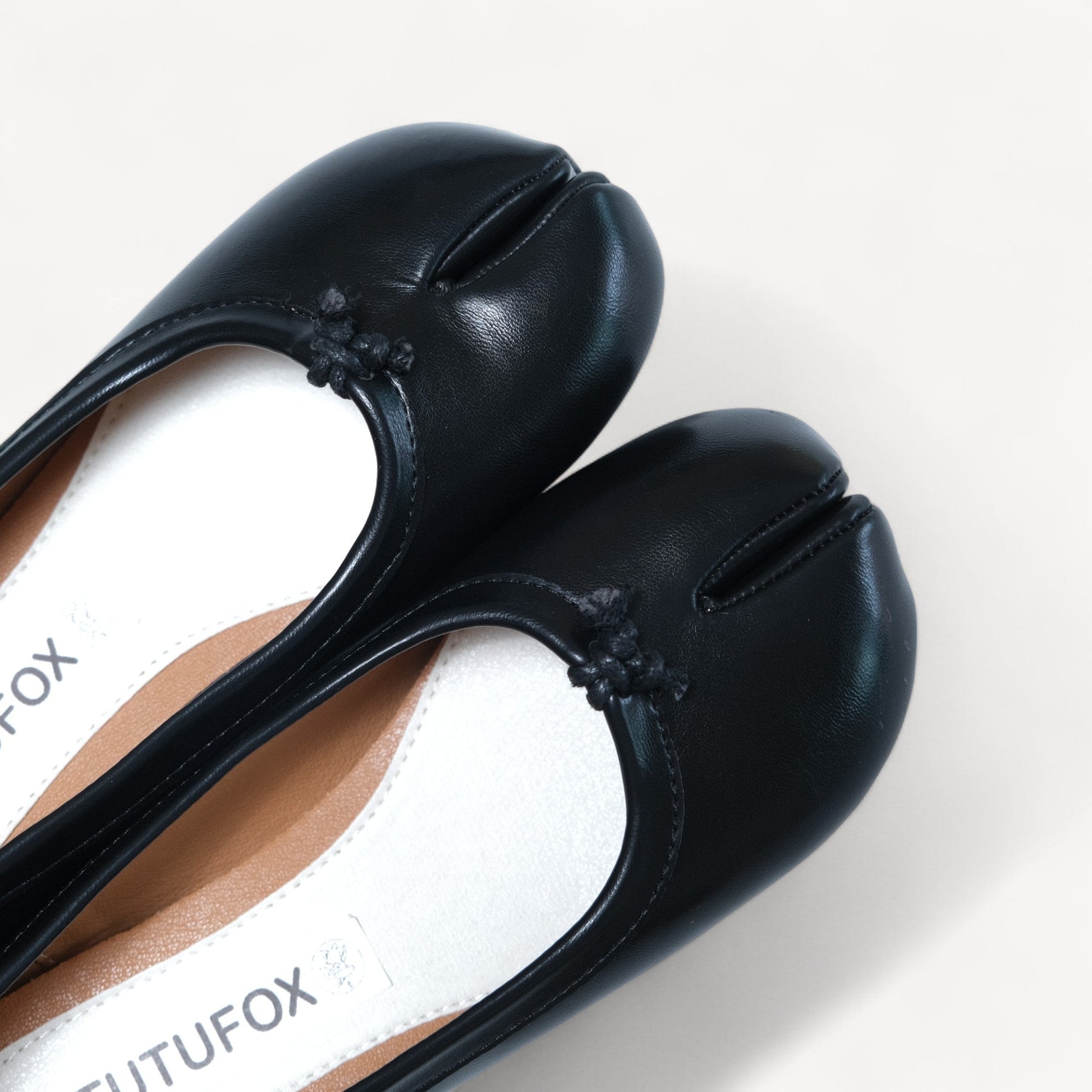 black split toe leather flats tabi toe detail view