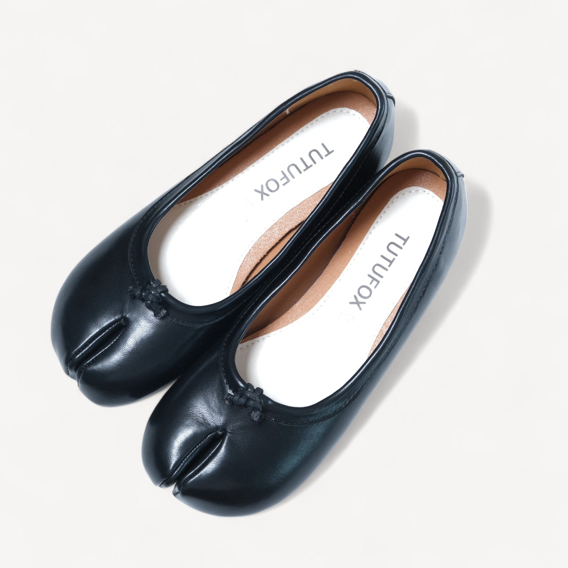black split toe leather flats tabi oblique view