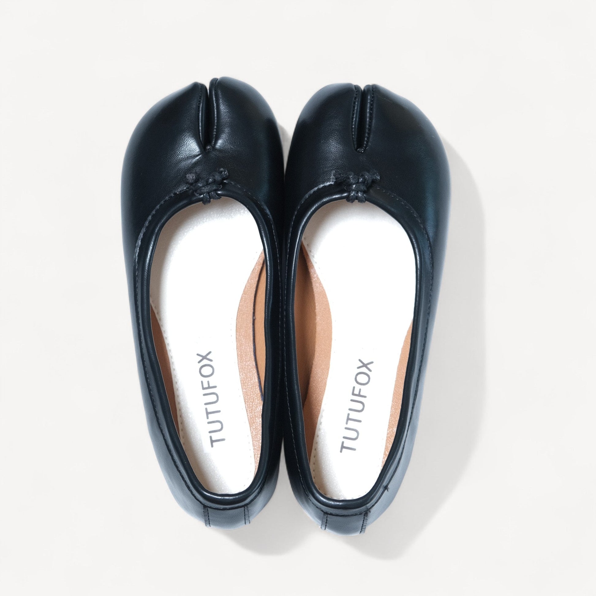 black split toe leather flats tabi front view