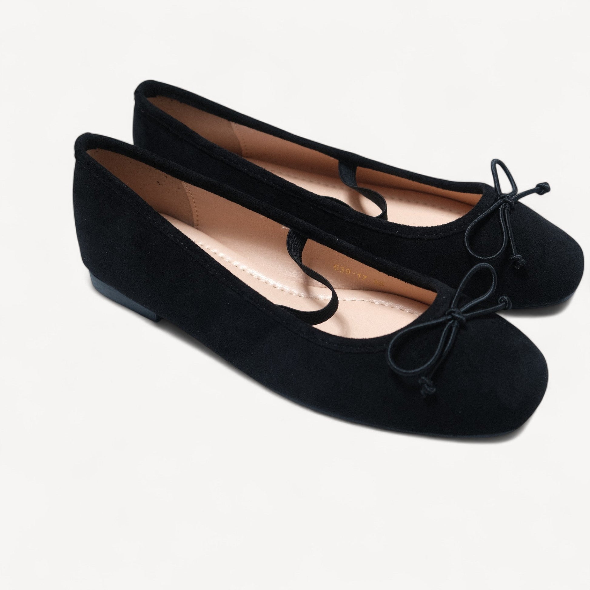 black suede almond toe flats right oblique view
