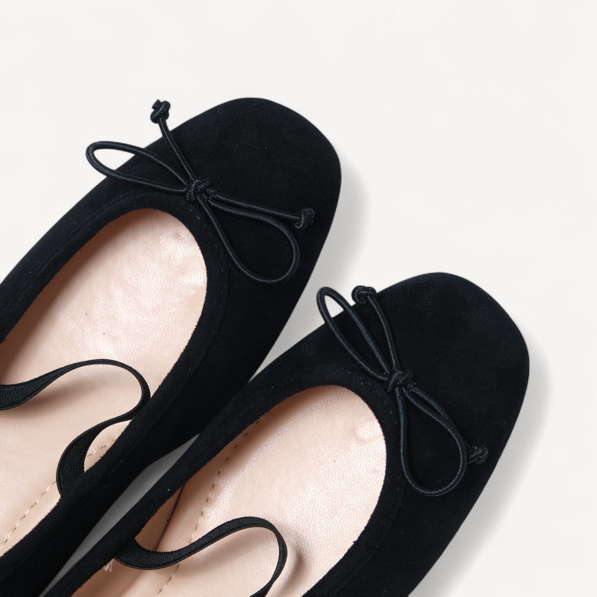 black suede almond toe flats toe detail view