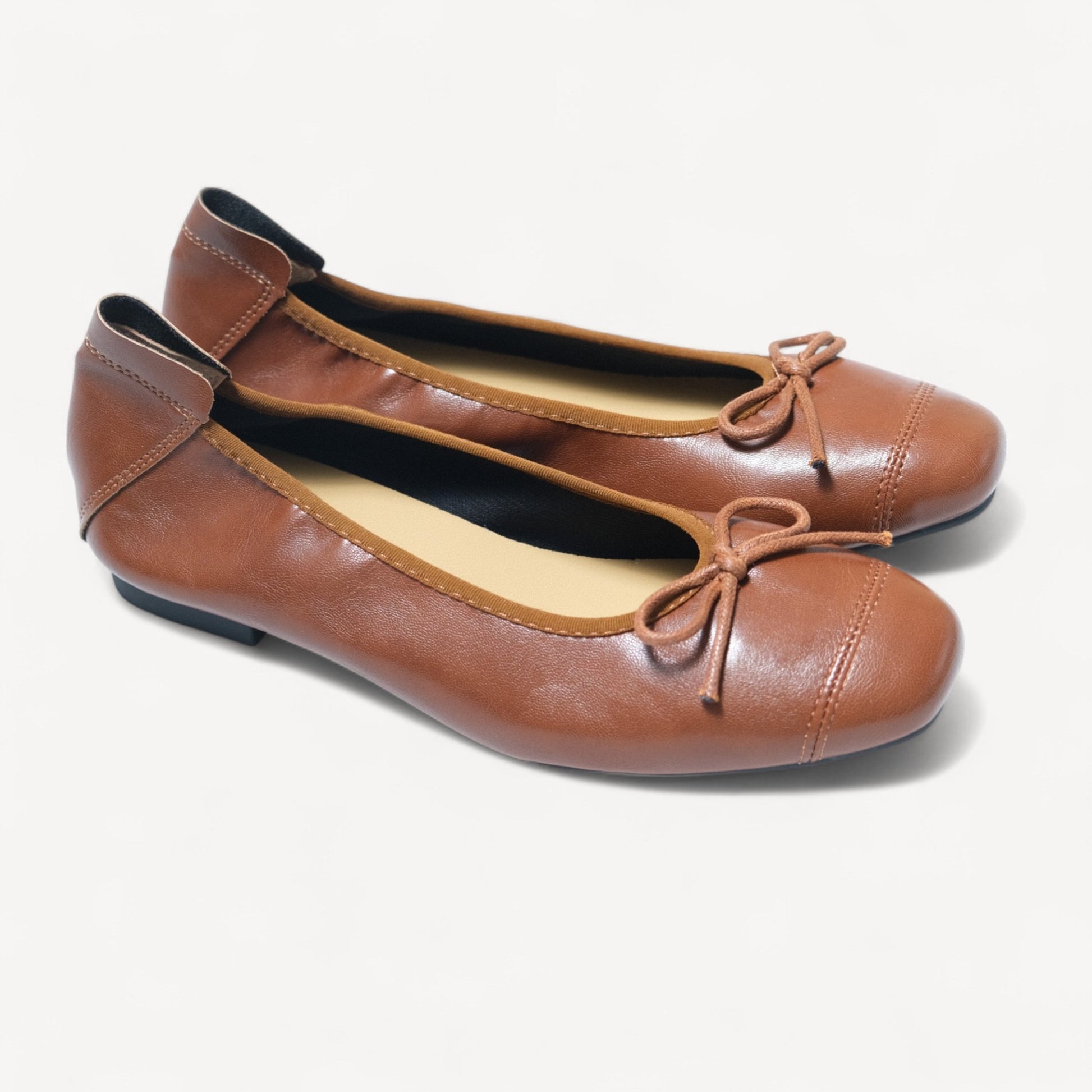 brown soft leather bow ballet flats right oblique view