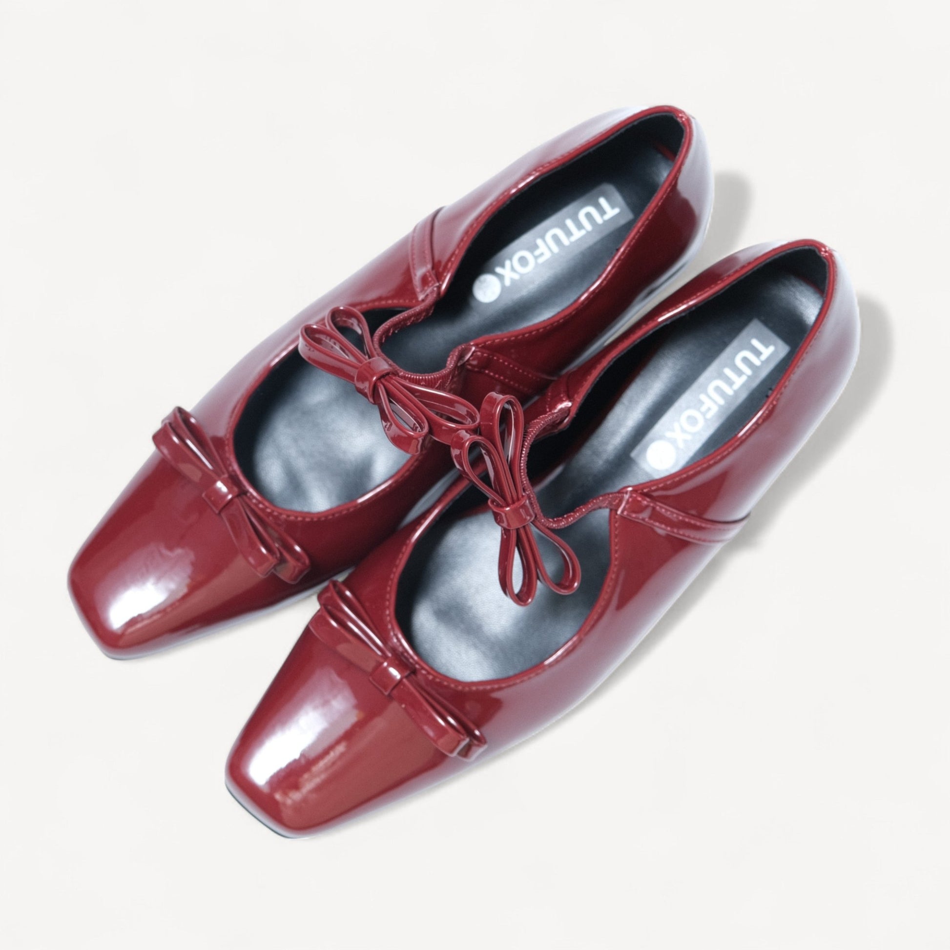burgundy patent bow mary jane ballet flats oblique view
