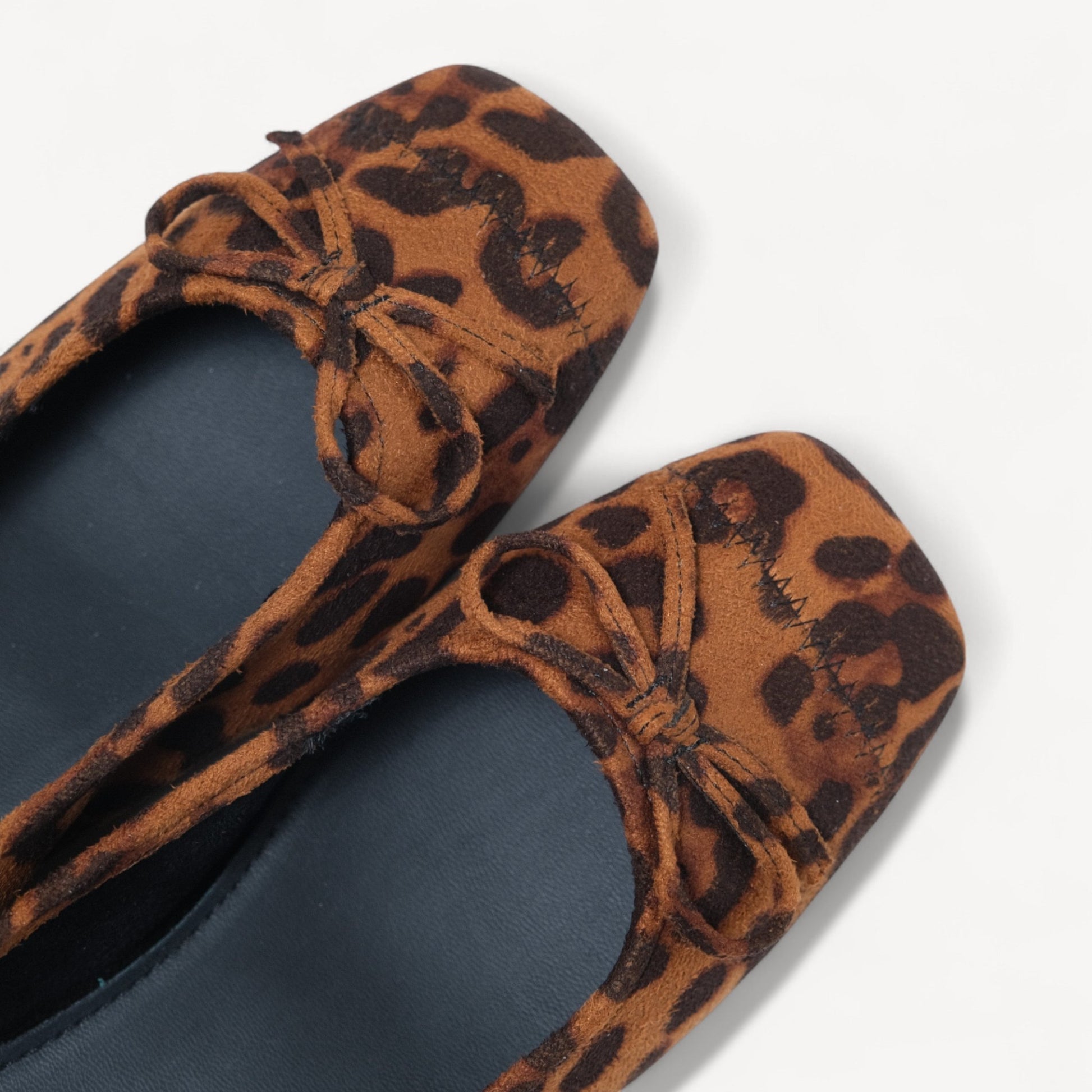 leopard suede bow low heel ballet flats toe detail view