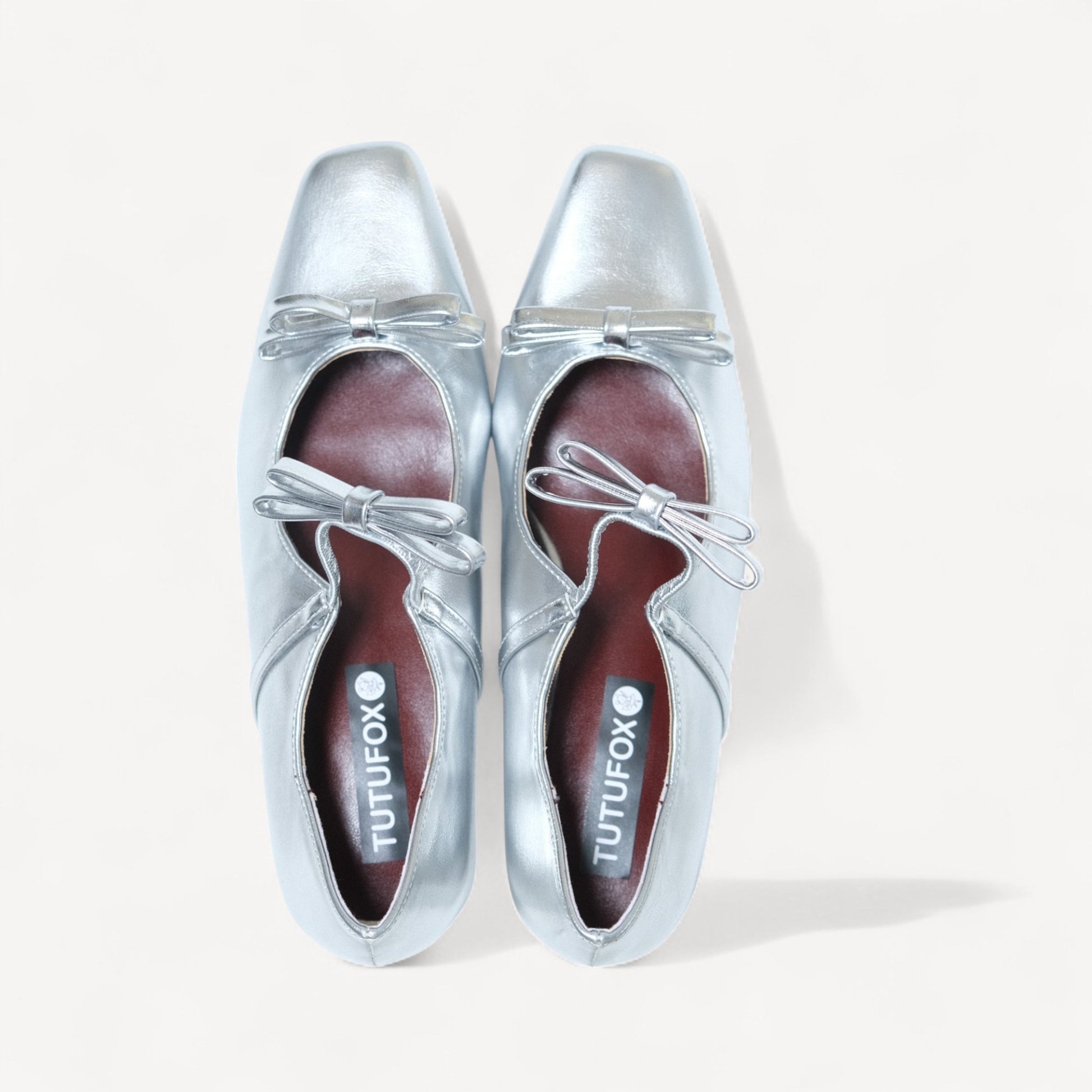 silver patent bow mary jane ballet flats front view