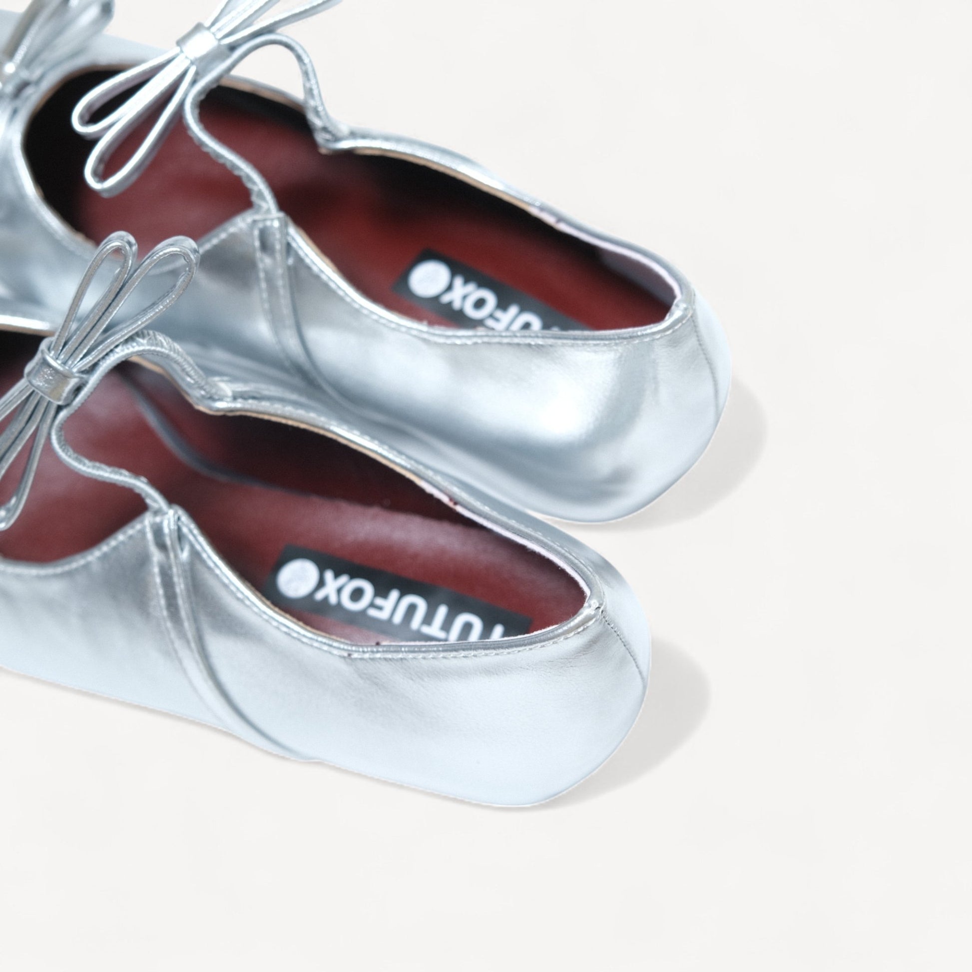 silver patent bow mary jane ballet flats heel detail