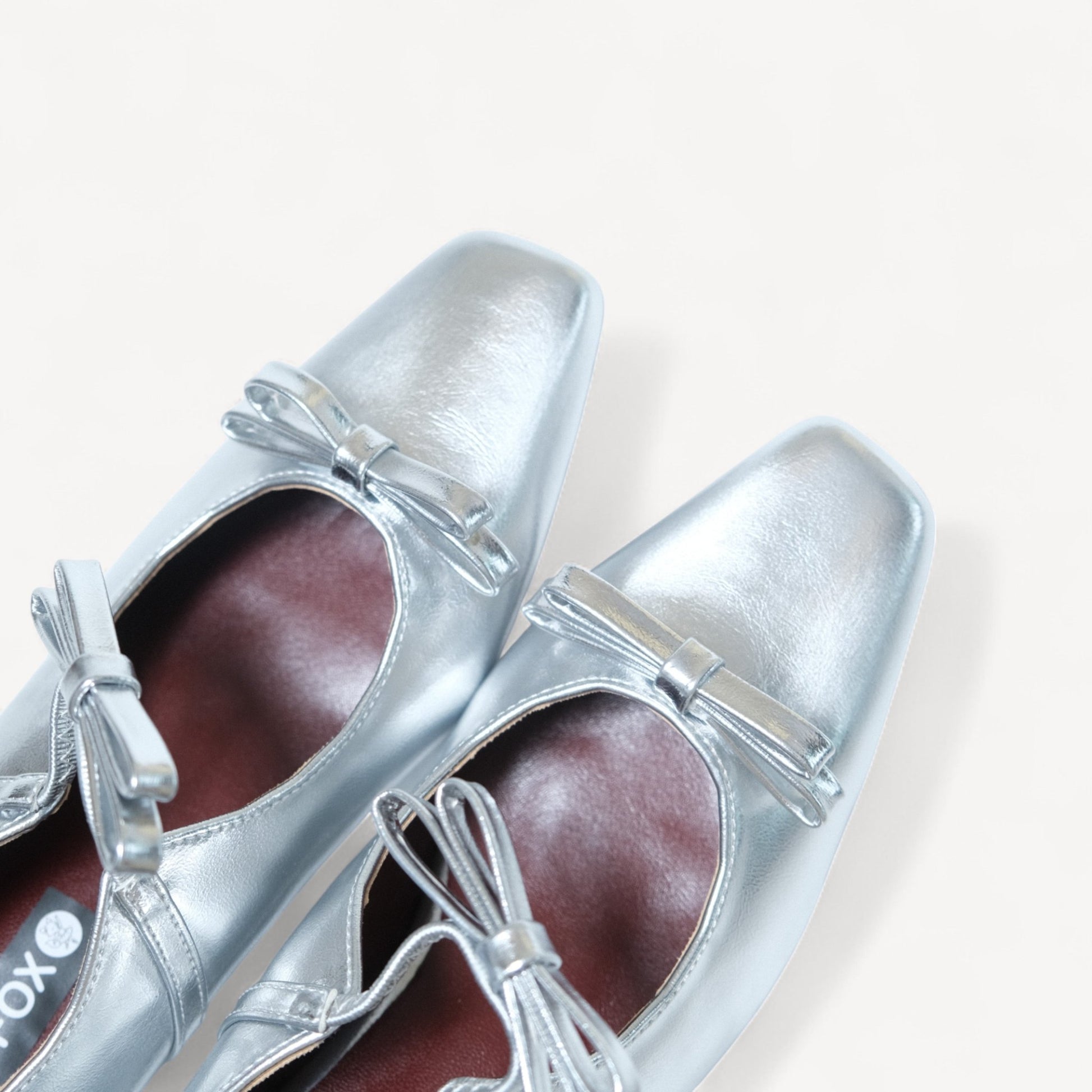 silver patent bow mary jane ballet flats toe detail