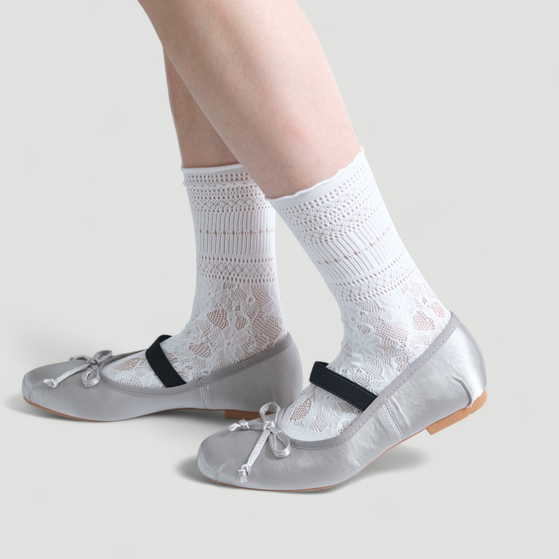 silver satin ballet flats model walking