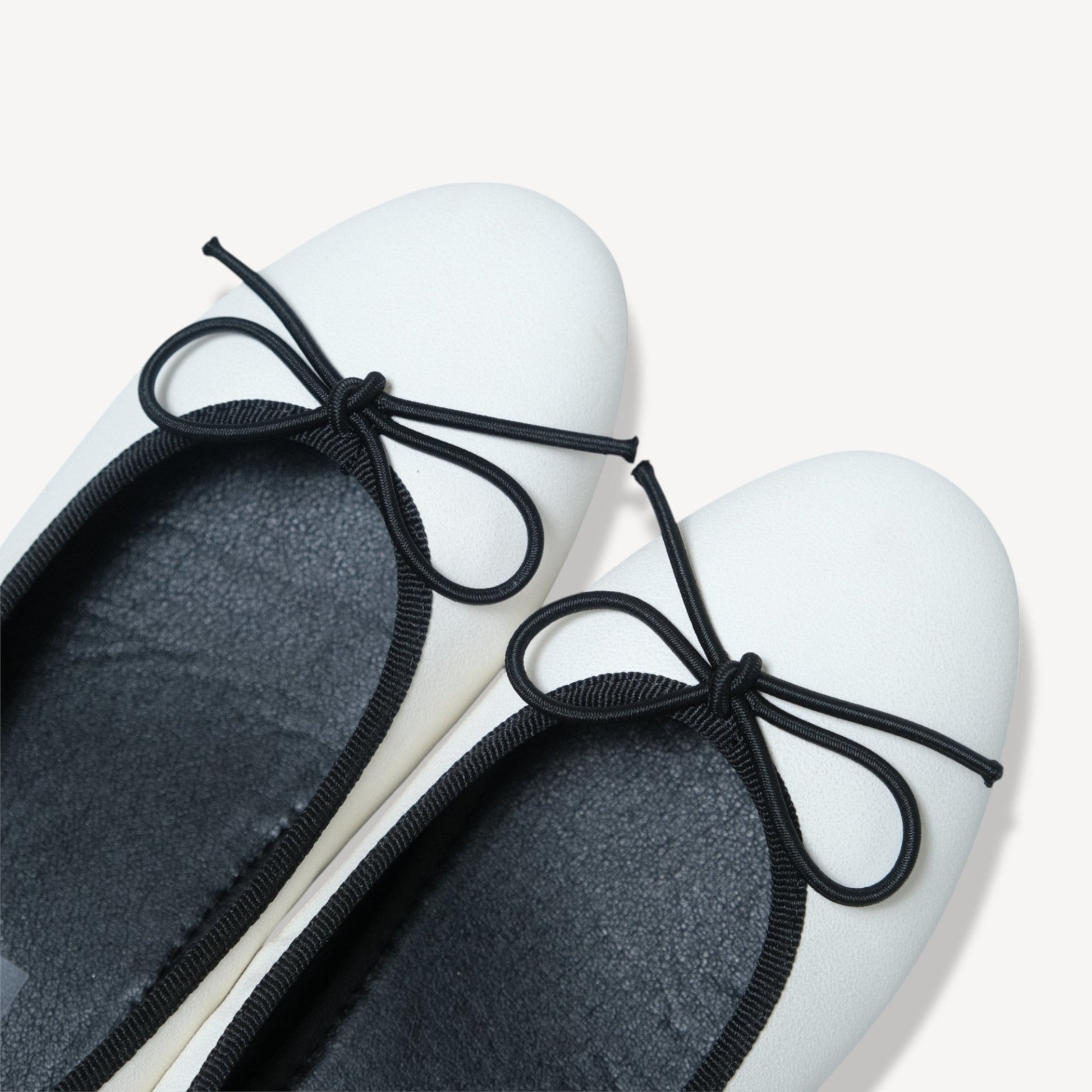 white almond toe bow ballet flats toe detail