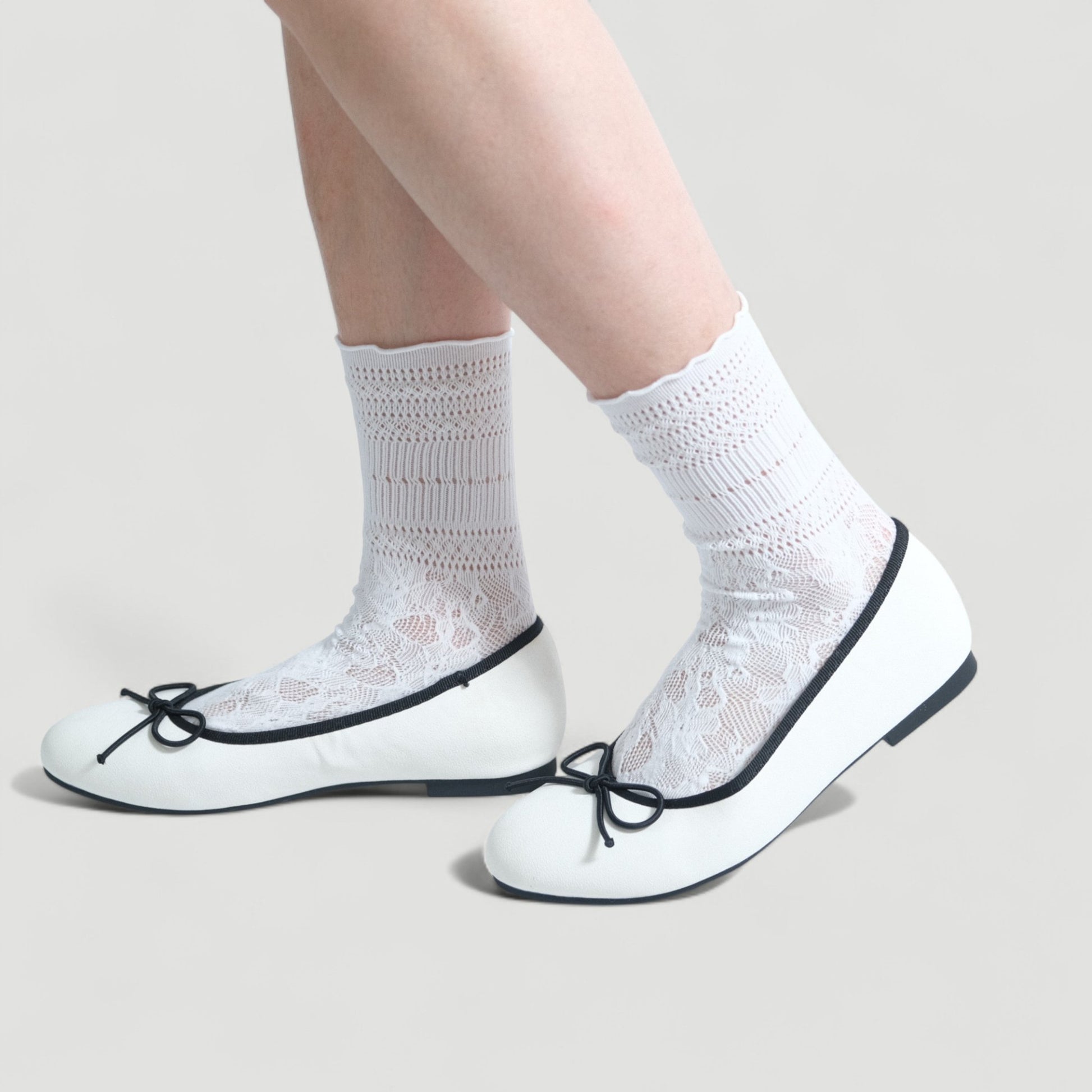 white almond toe bow ballet flats model walking