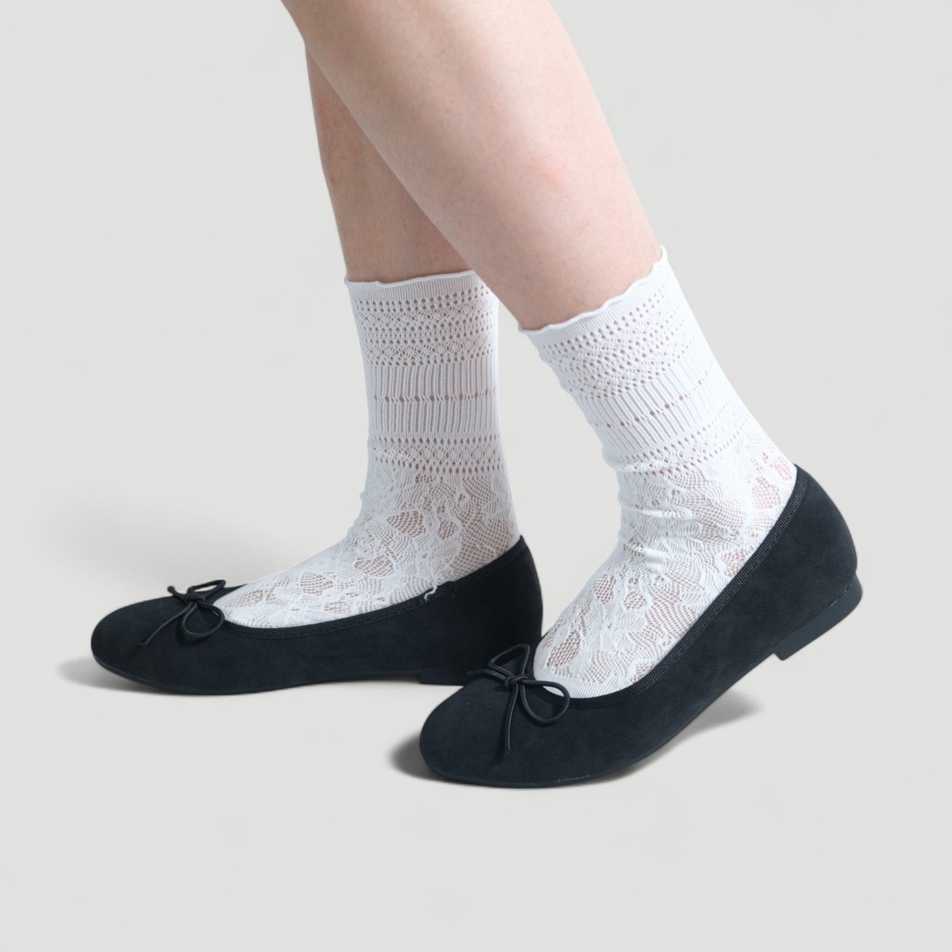 black almond toe bow ballet flats model walking 