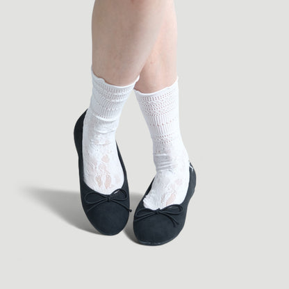black almond toe bow ballet flats model posing  