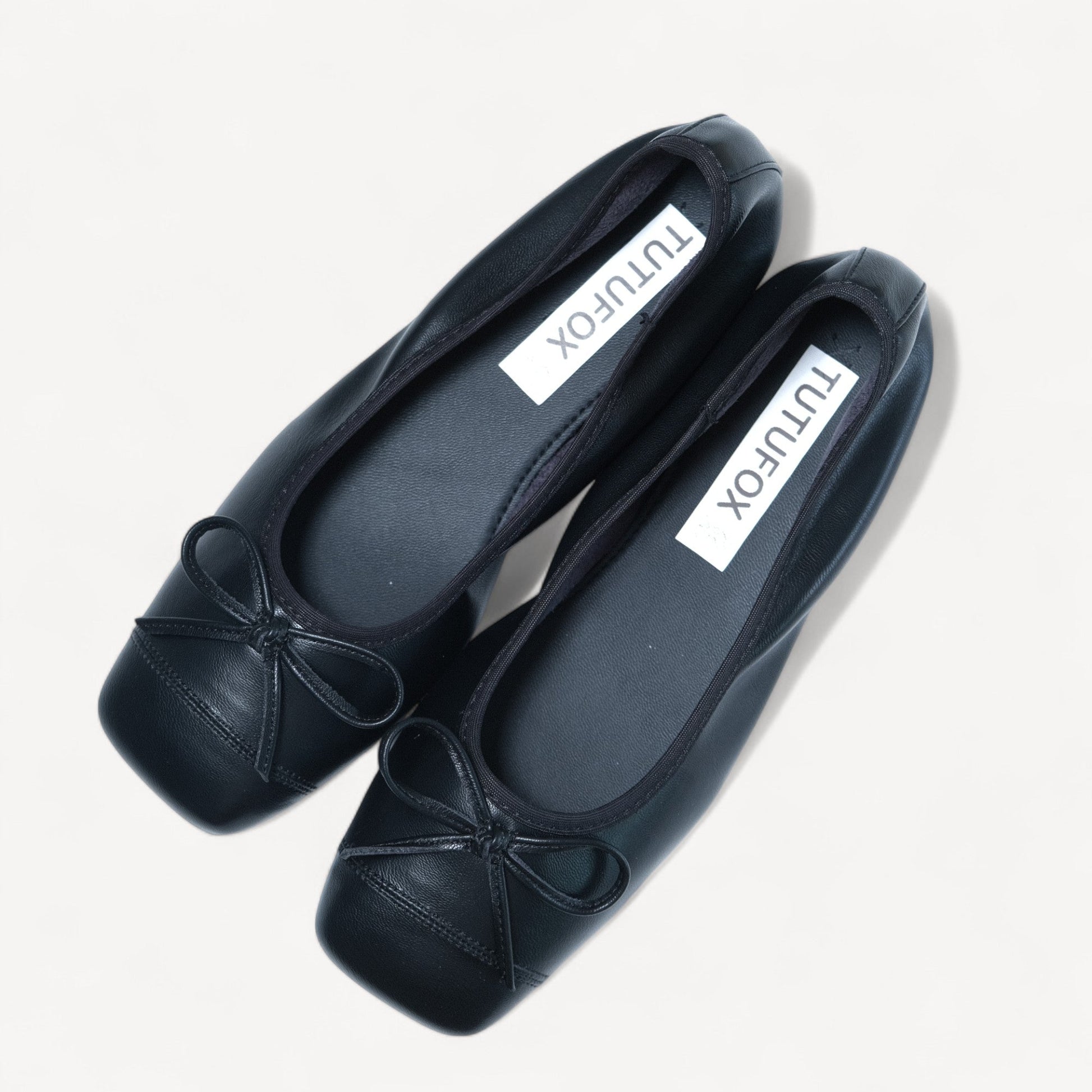 black bow square toe leather ballet flats oblique view