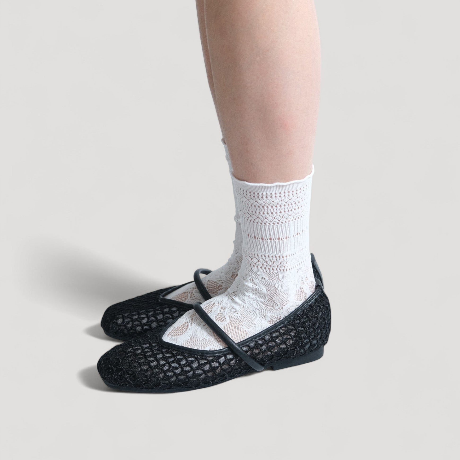 black mary jane almond toe flats sandals model standing 