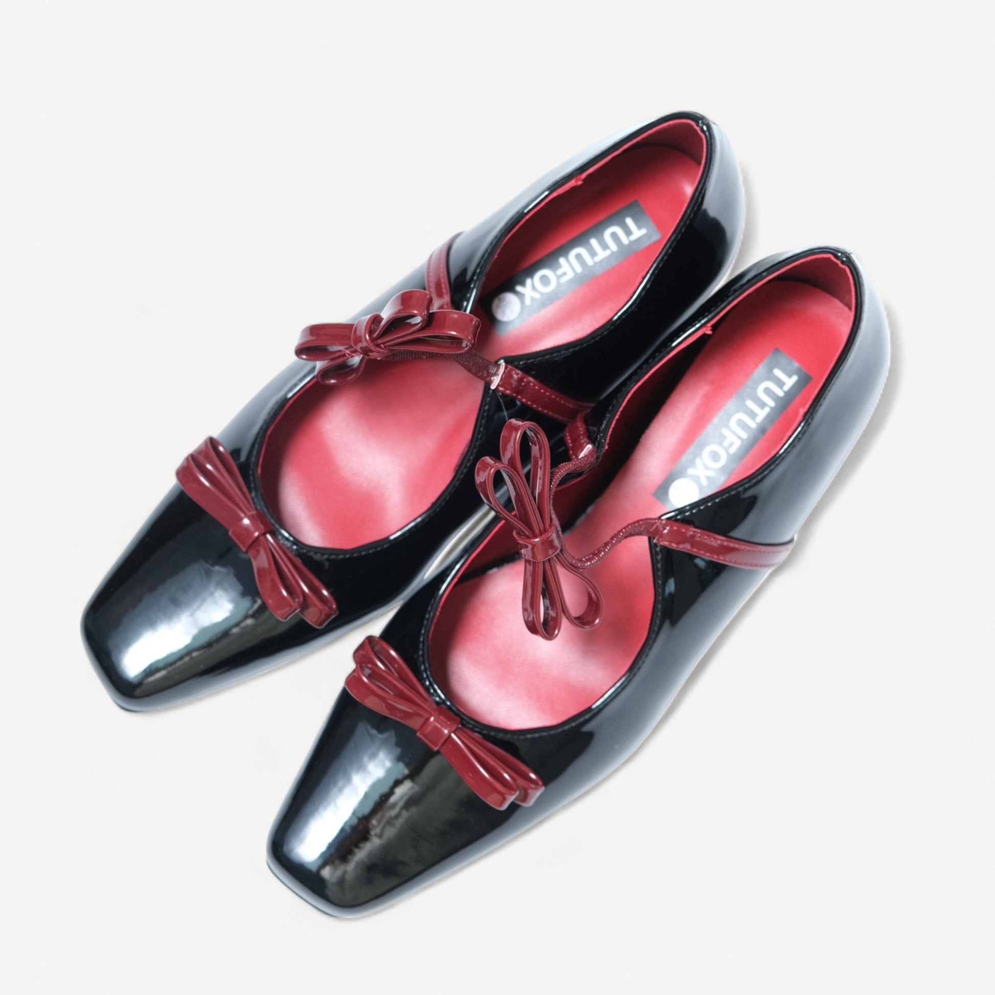 black patent mary jane bow flats right oblique view  