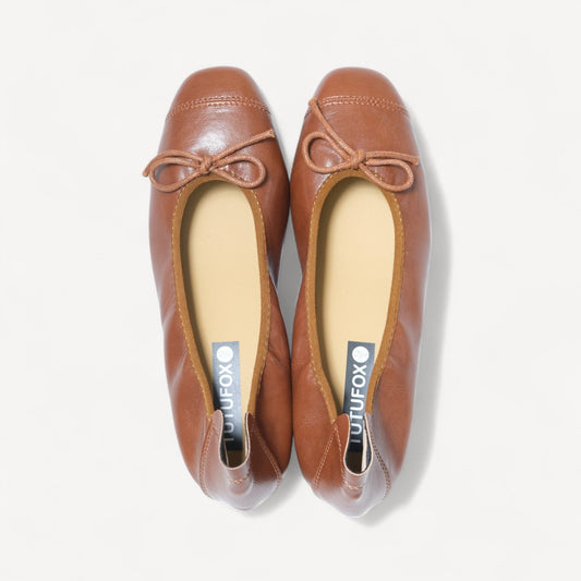 brown soft leather bow ballet flats front view