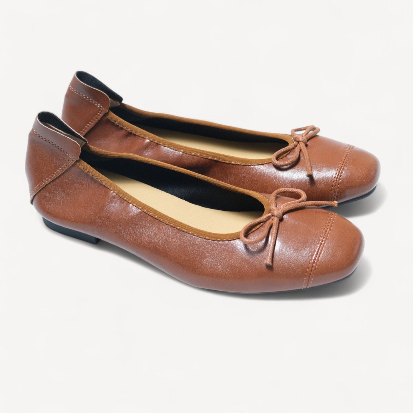brown soft leather bow ballet flats right oblique view  