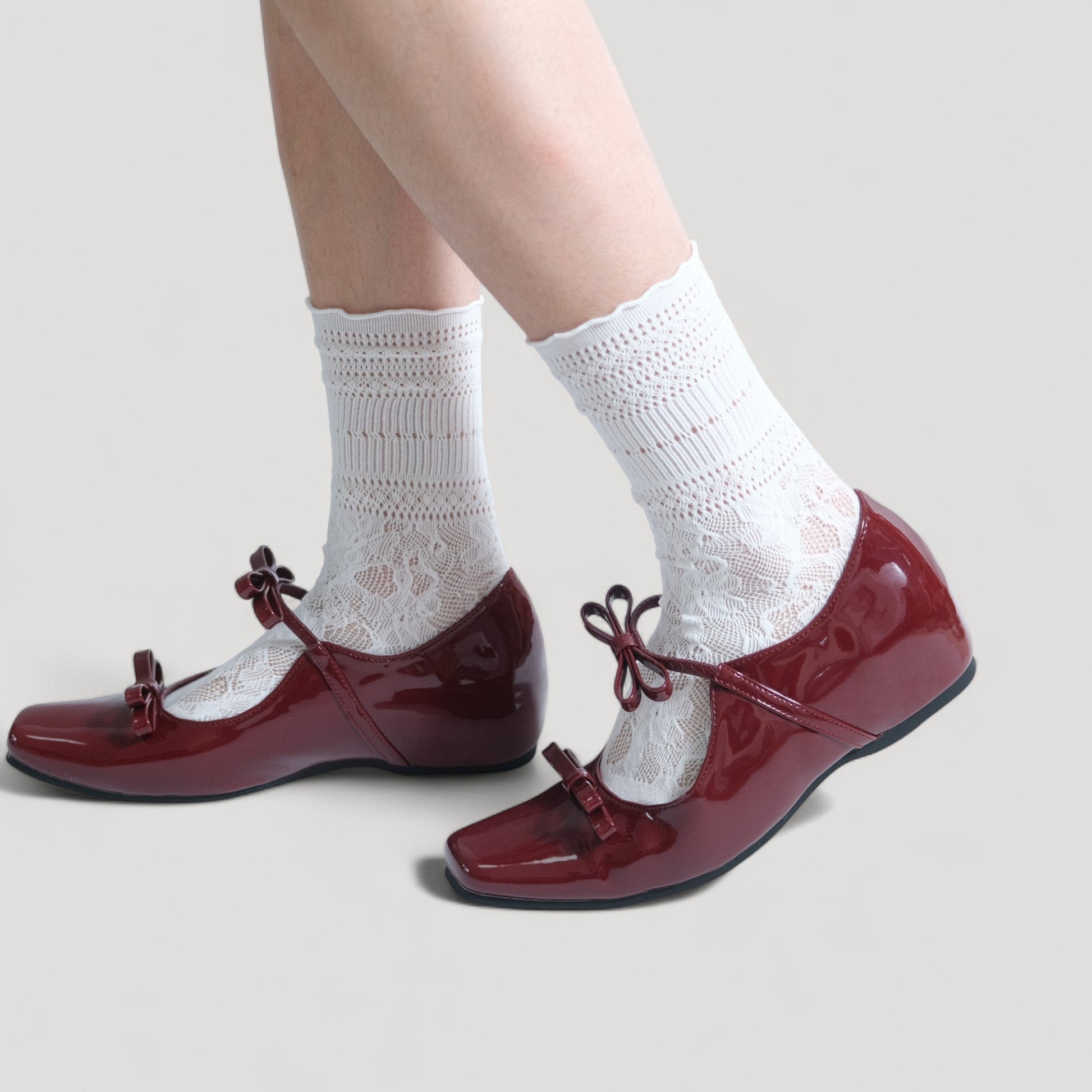 burgundy patent bow mary jane ballet flats model walking  