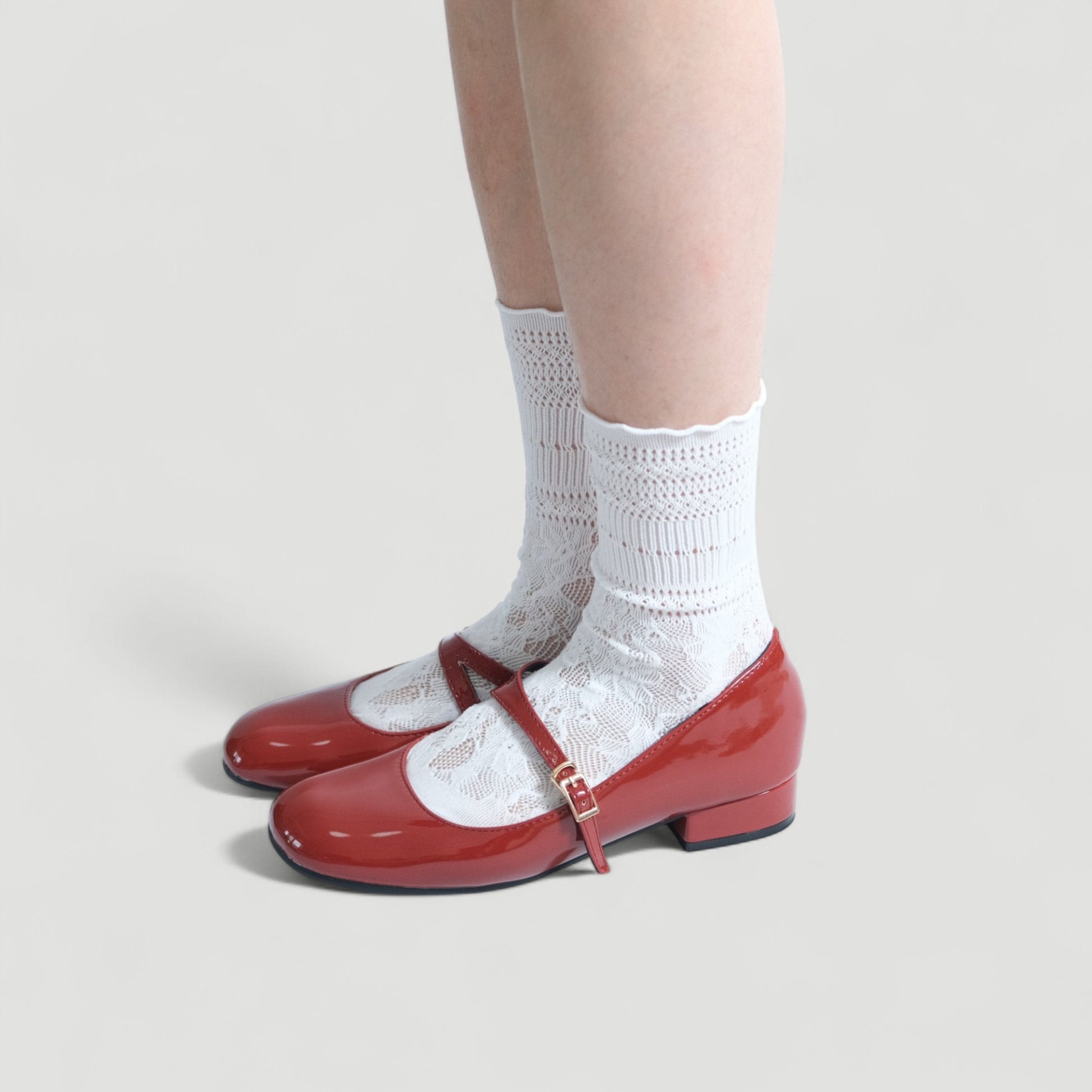 red patent mary jane buckle round toe flats model standing 