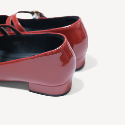 red patent mary jane buckle round toe flats heel detail  