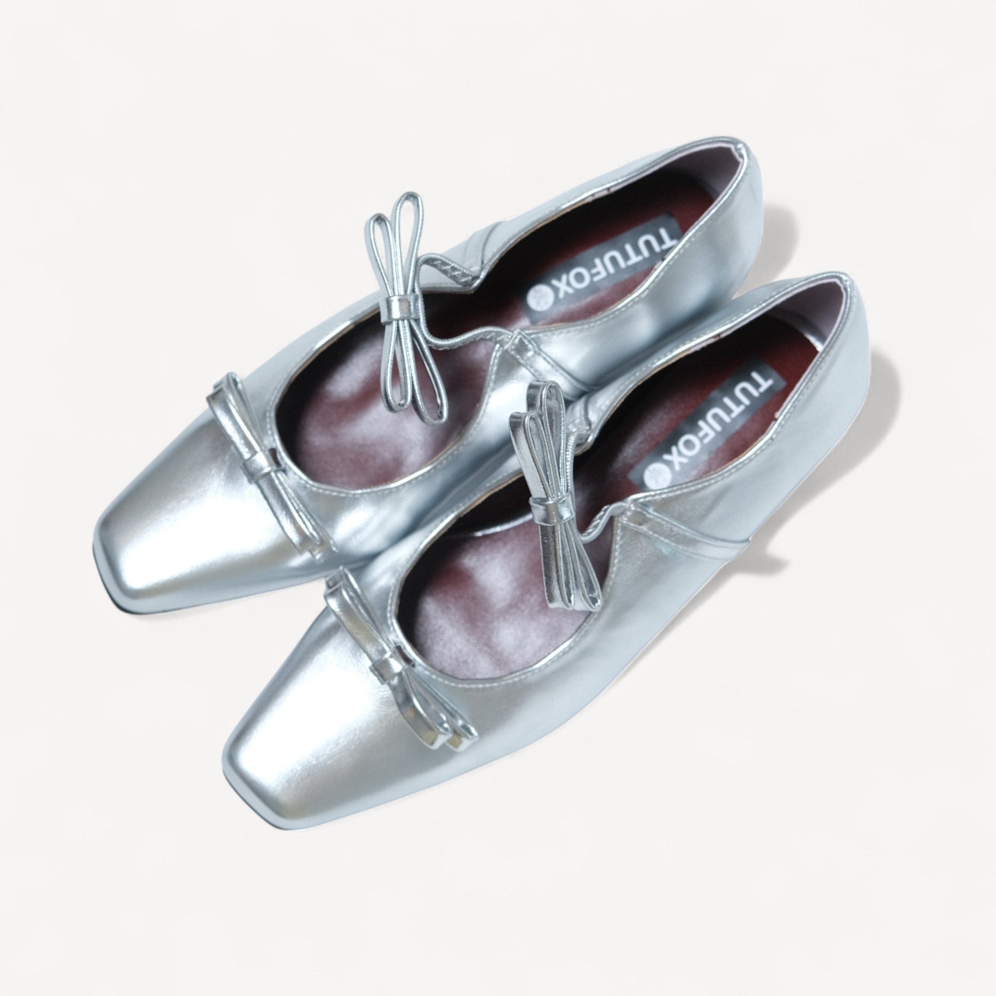 silver patent bow mary jane ballet flats oblique view 