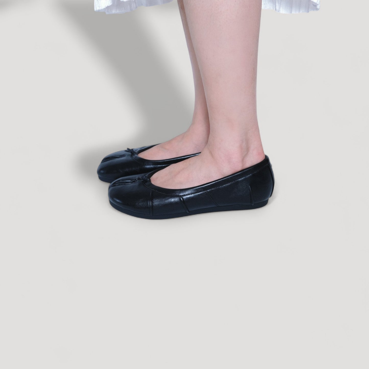 split toe leather flats tabis black model standing