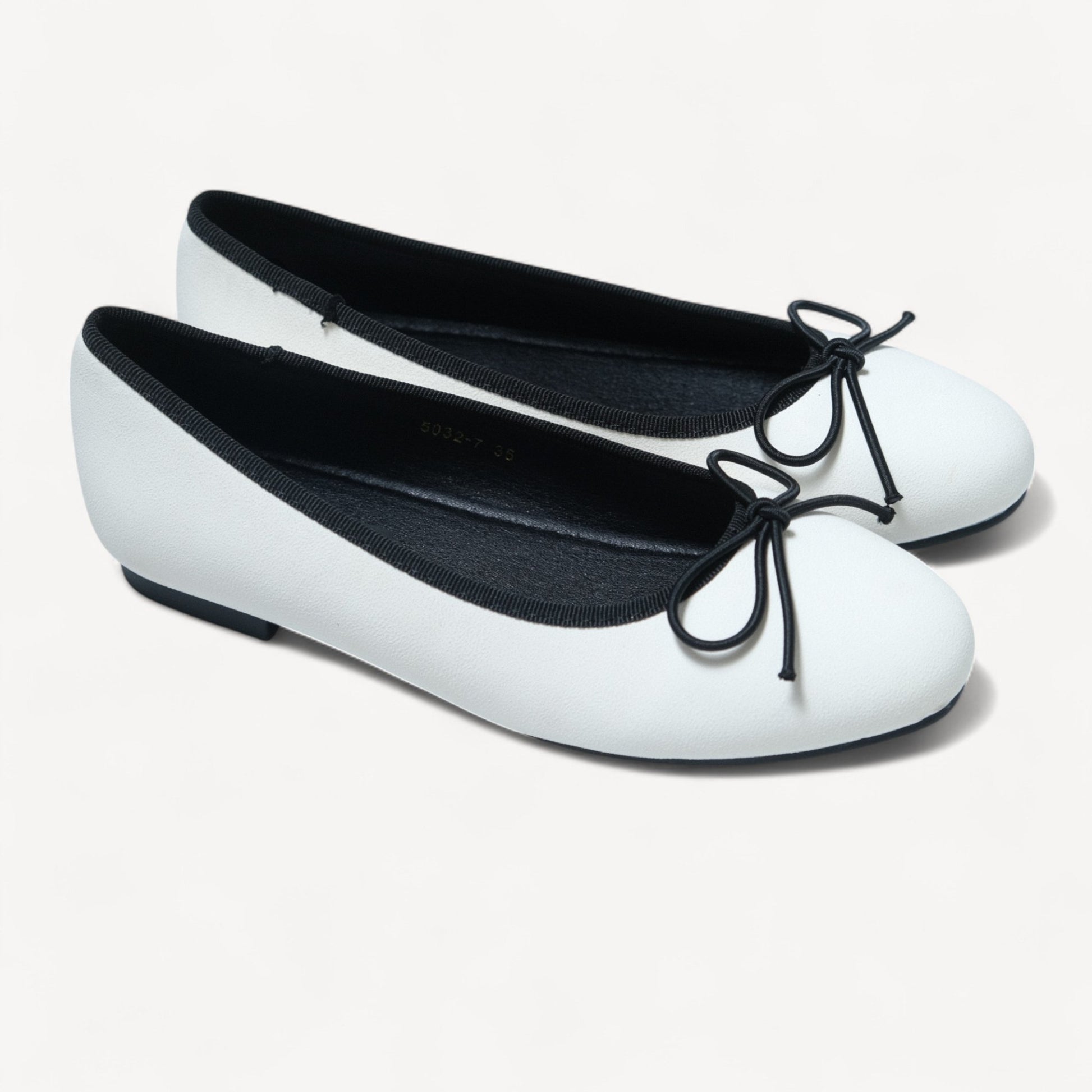 white almond toe bow ballet flats right oblique view  