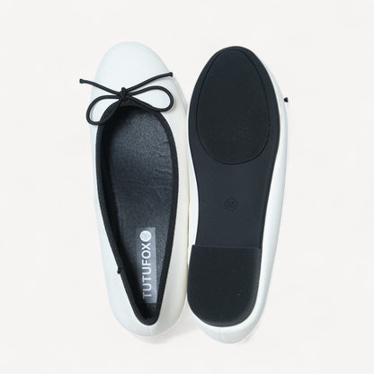 white almond toe bow ballet flats sole view  